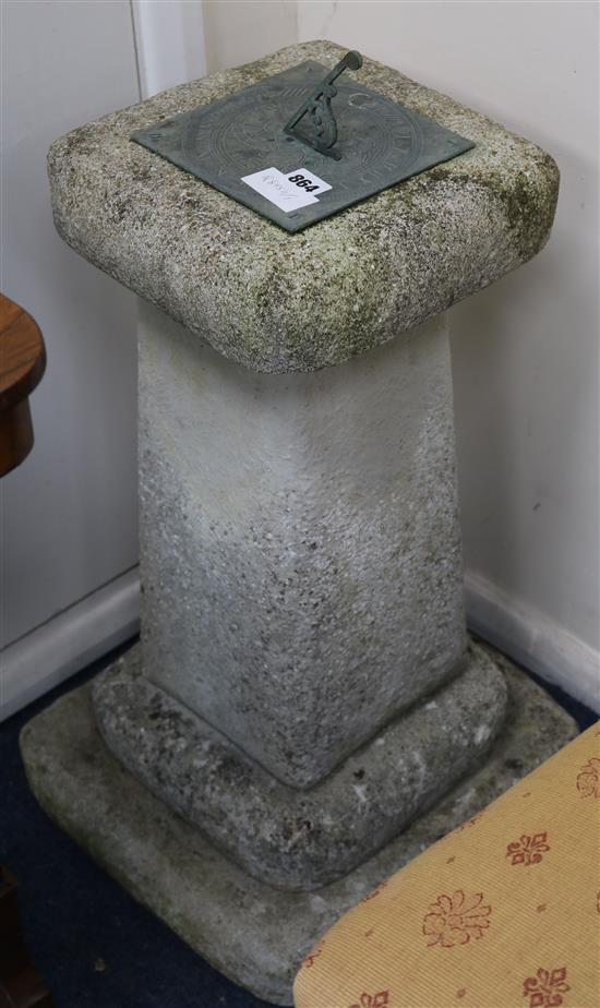 A reconstituted stone sundial H.63cm